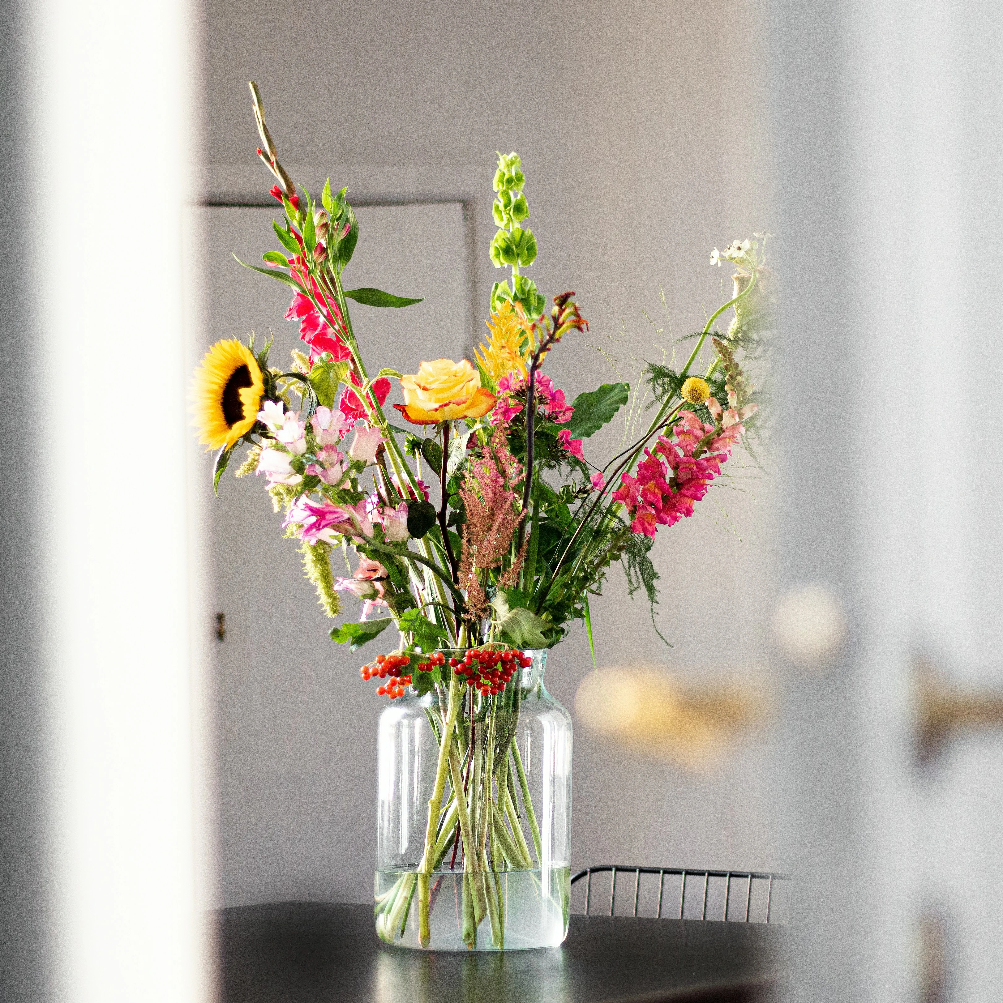Use fresh flowers, plants and greenery