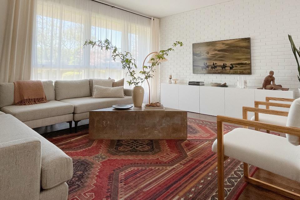 Add carpets and rugs for a cozy and inviting atmosphere